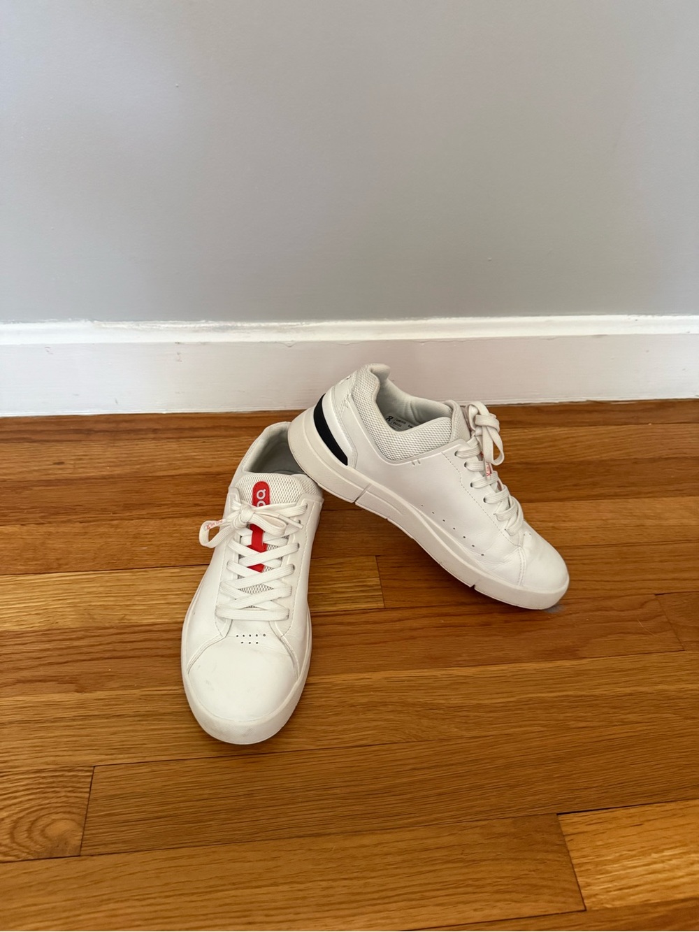 White Low-Top Sneakers with Red Tongue Accent